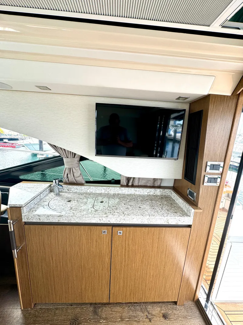 Slide: The Image of Upper Salon Area Wet Bar / Entertainment - 17