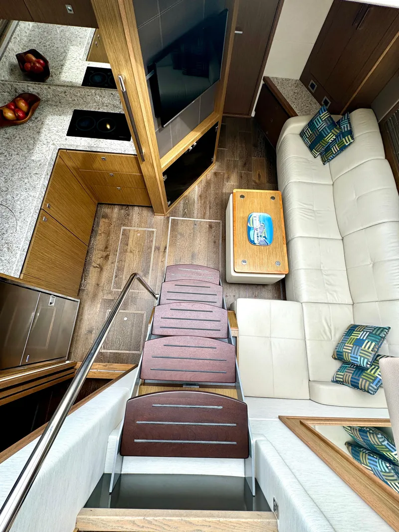 Slide: The Image of Stairwell to Lower Salon / Galley - 25