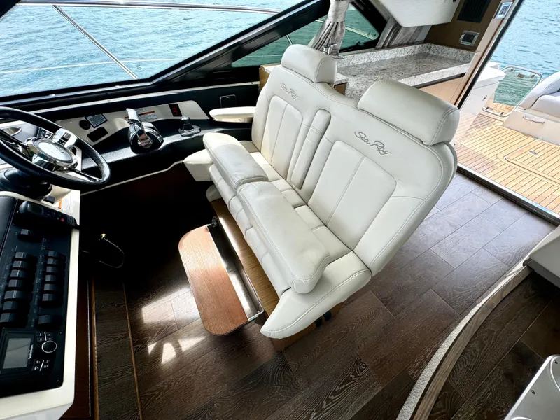 Slide: The Image of Dual Helm Seats w/ Fold-Down Foot Rest - 64