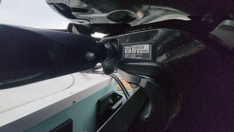Slide: The Image of Close-up of Yamaha motor on 2024 Tidewater 2700 Carolina Bay boat. - 28
