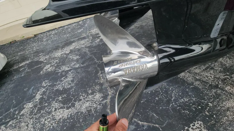 Slide: The Image of Close-up of a Yamaha stainless steel propeller on a 2024 Tidewater 2700 Carolina Bay boat. - 32