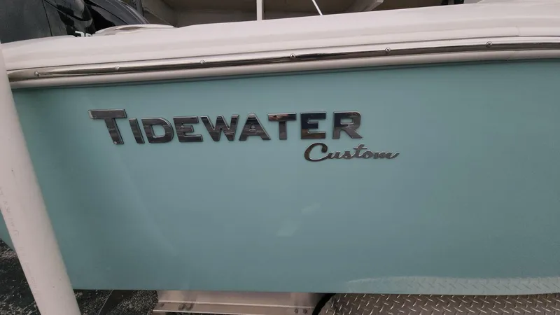 Slide: The Image of 2024 Tidewater 2700 Carolina Bay boat with custom lettering on the side. - 42