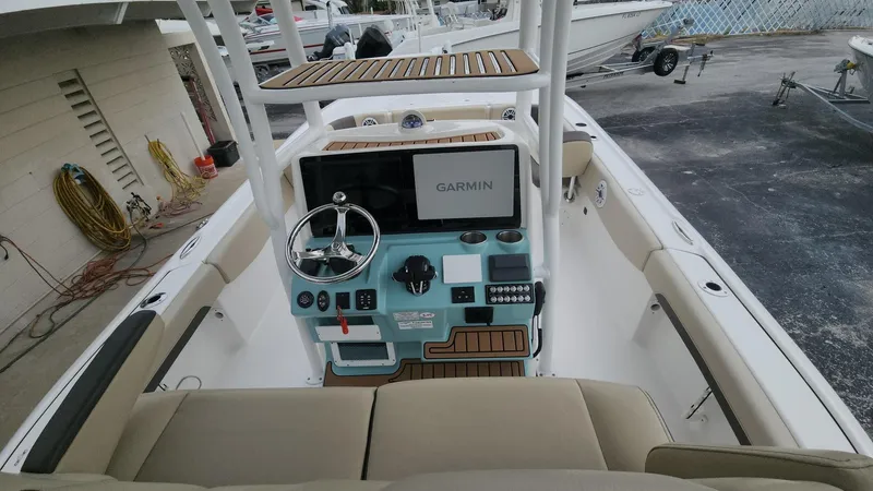 Slide: The Image of 2024 Tidewater 2700 Carolina Bay boat console with Garmin navigation system. - 45