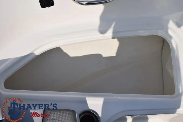 Slide: The Image of 2025 Bayliner VR5 Bowrider storage compartment, Thayer's Marine logo visible. - 15