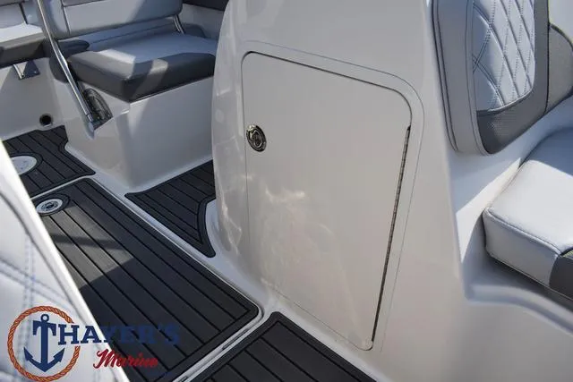 Slide: The Image of 2025 Bayliner VR5 Bowrider interior with seating and storage compartment. - 18