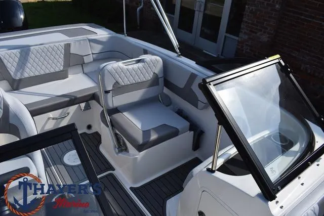 Slide: The Image of 2025 Bayliner VR5 Bowrider interior with modern seating and sleek design. - 22
