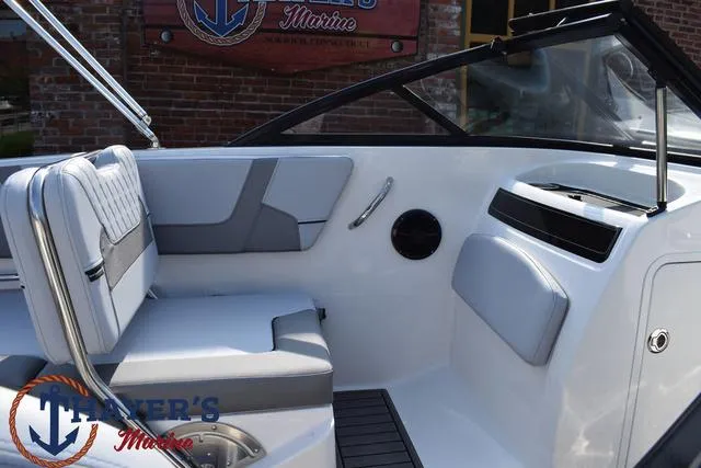 Slide: The Image of 2025 Bayliner VR5 Bowrider interior with gray seating and sleek design. - 23