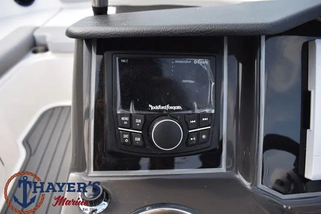 Slide: The Image of 2025 Bayliner VR5 Bowrider dashboard with Rockford Fosgate audio system. - 31