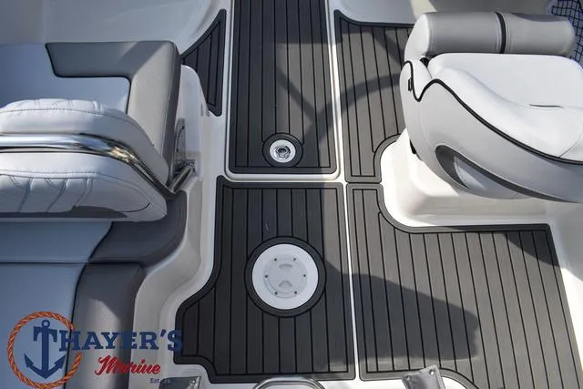 Slide: The Image of 2025 Bayliner VR5 Bowrider interior with sleek seating and modern flooring design. - 32