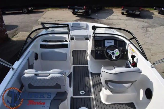Slide: The Image of 2025 Bayliner VR5 Bowrider Outboard interior with modern dashboard and seating. - 46