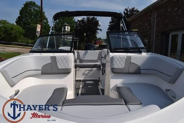 Slide: The Image of 2025 Bayliner VR5 Bowrider Outboard boat interior with seating, showcased by Thayer's Marine. - 47