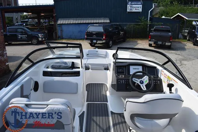 Slide: The Image of 2025 Bayliner VR5 Bowrider Outboard interior at Thayer's Marine dealership. - 8
