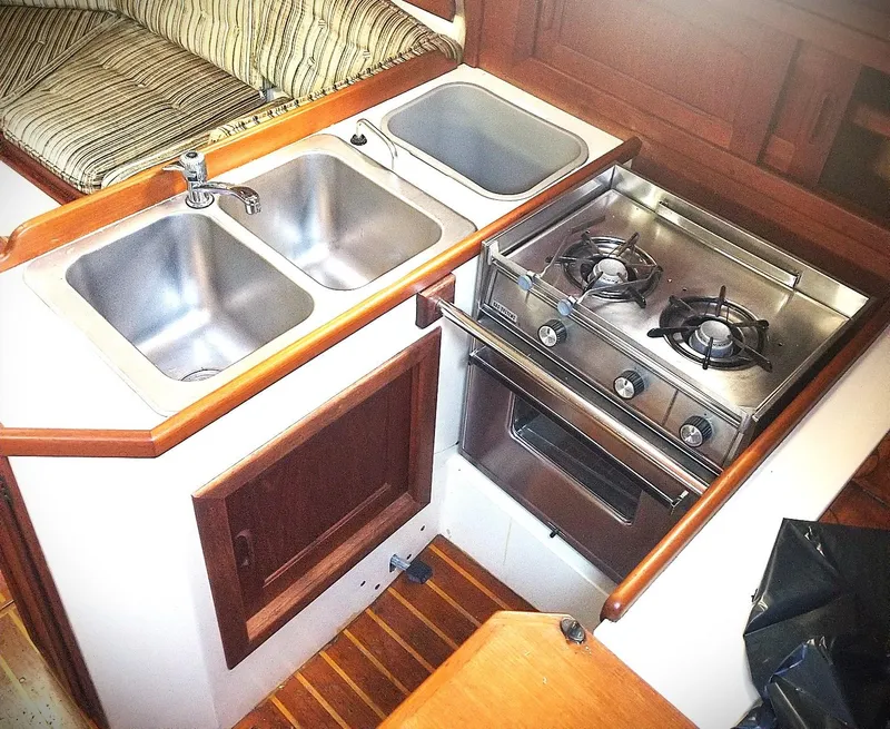 Slide: The Image of 1983 Pacific Seacraft Crealock 37 galley with double sink and stove. - 3