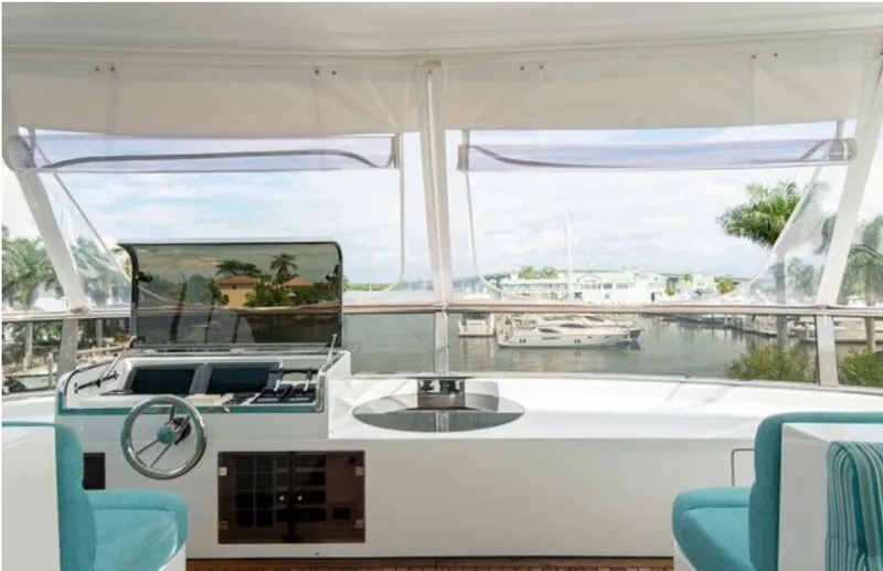 Slide: The Image of Luxurious 2010 Horizon 136 Premier yacht interior with marina view. - 2