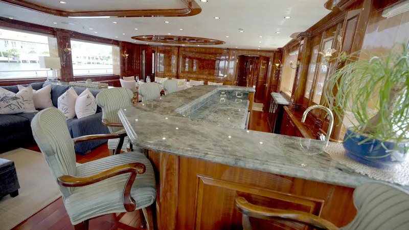 Slide: The Image of Luxurious yacht interior with elegant bar and seating, Horizon 136 Premier, 2010 model. - 23