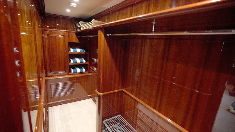 Slide: The Image of Luxurious wooden closet interior on 2010 Horizon 136 Premier yacht. - 34