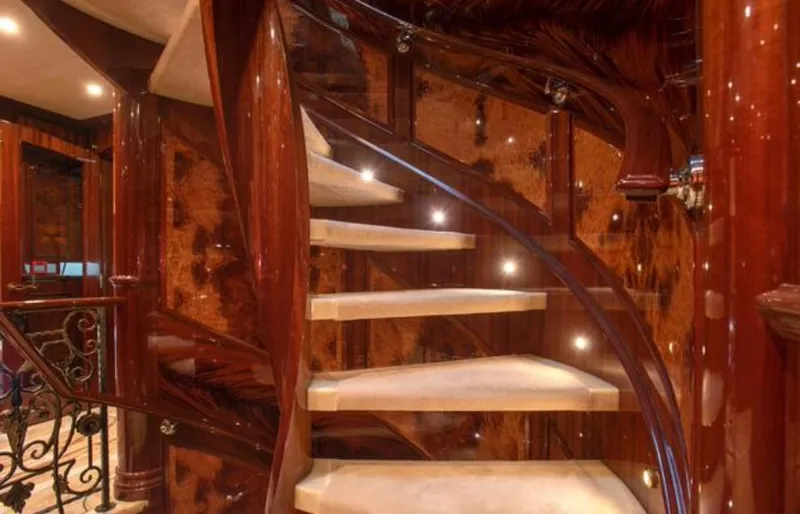 Slide: The Image of Luxurious spiral staircase with wooden finish on Horizon 136 Premier yacht, 2010 model. - 36