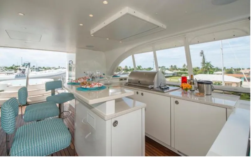 Slide: The Image of Luxurious yacht interior with modern kitchen and seating, Horizon 136 Premier, 2010 model. - 4
