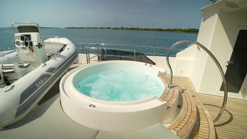 Slide: The Image of Luxury yacht deck with jacuzzi and inflatable boat, Horizon 136 Premier, 2010 model. - 5