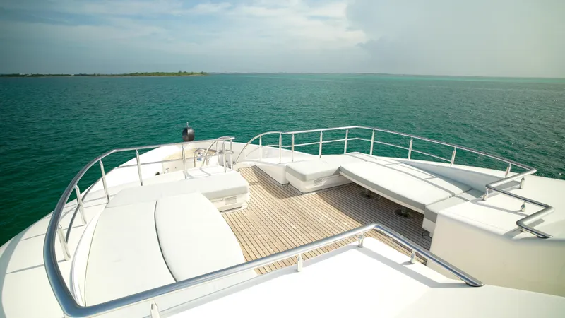 Slide: The Image of Luxurious Horizon 136 Premier yacht deck overlooking serene ocean waters, 2010 model. - 7