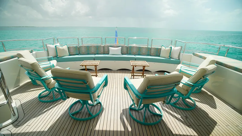 Slide: The Image of Luxurious Horizon 136 Premier yacht deck with turquoise seating, ocean view, 2010 model. - 8