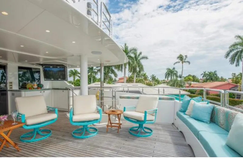 Slide: The Image of Luxurious deck of 2010 Horizon 136 Premier yacht with seating and tropical view. - 9
