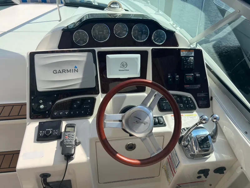 Slide: The Image of Control panel of a 2010 Sea Ray 350 Sundancer with Garmin navigation system. - 20