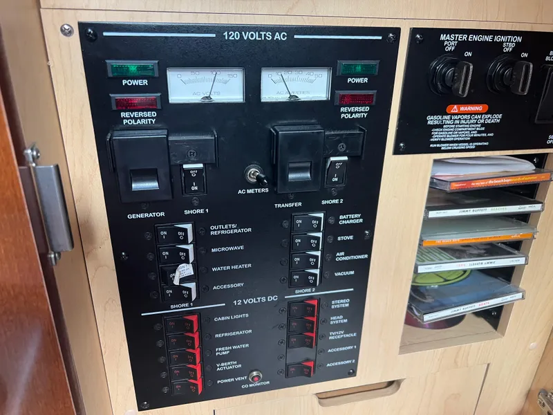 Slide: The Image of Electrical control panel on a 2010 Sea Ray 350 Sundancer boat. - 29