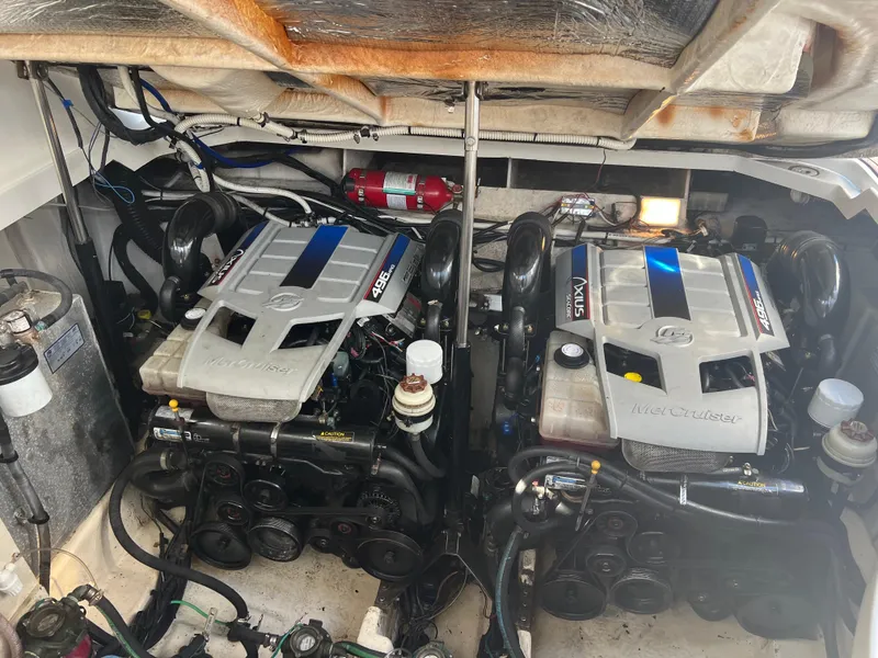Slide: The Image of Engine compartment of a 2010 Sea Ray 350 Sundancer with twin MerCruiser engines. - 35