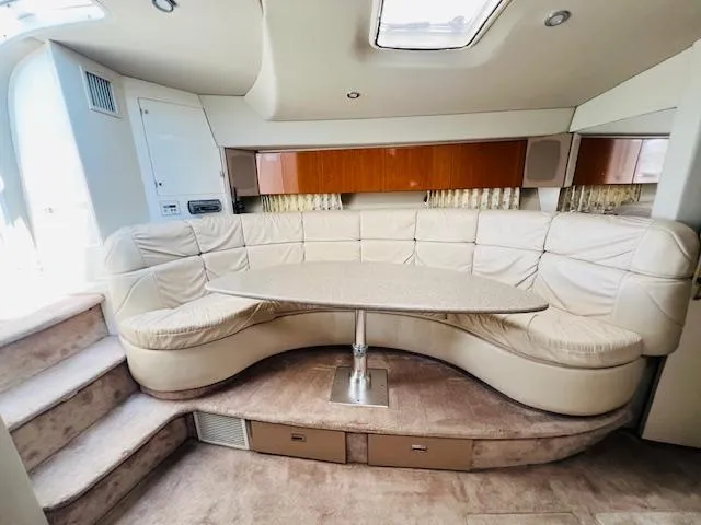 Slide: The Image of Luxurious interior of a 2000 Formula 41 PC yacht with plush seating and elegant design. - 14
