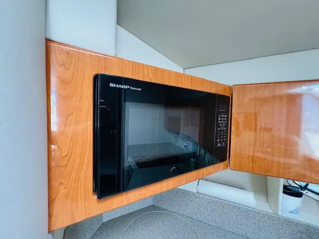 Slide: The Image of Sharp Carousel microwave in a 2000 Formula 41 PC yacht kitchen. - 15