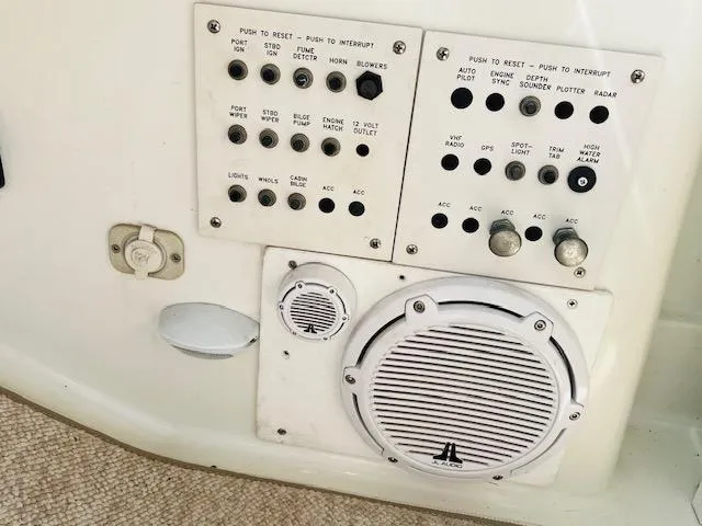 Slide: The Image of Control panel and speakers on a 2000 Formula 41 PC boat. - 25