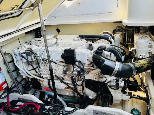 Slide: The Image of Engine compartment of a 2000 Formula 41 PC boat, showcasing detailed mechanical components. - 28