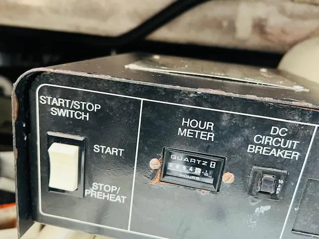 Slide: The Image of Control panel of a 2000 Formula 41 PC with start/stop switch and hour meter. - 31