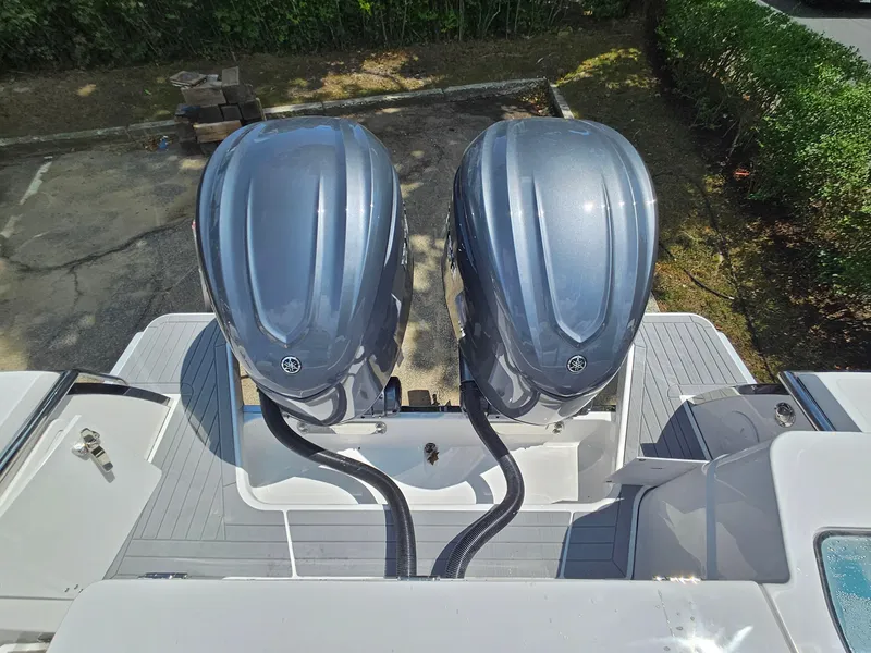 Slide: The Image of 2025 Southport 30 FE boat with dual outboard engines, aerial view. - 10