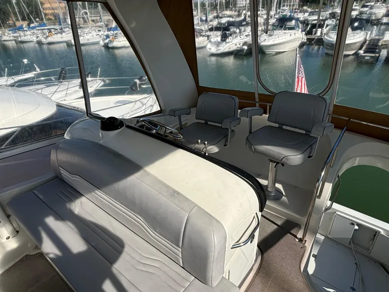 Slide: The Image of Interior of 2008 Carver 360 Sport Sedan with marina view through windows. - 18