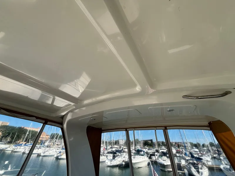 Slide: The Image of Interior view of 2008 Carver 360 Sport Sedan with marina backdrop. - 19