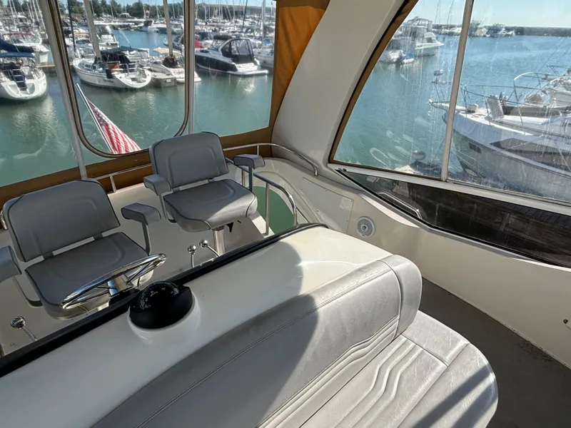 Slide: The Image of Interior of 2008 Carver 360 Sport Sedan with marina view. - 20