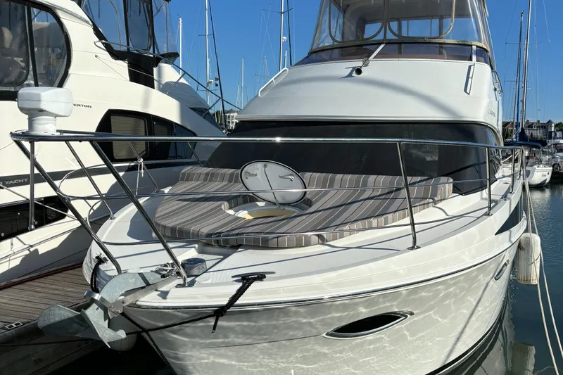 Slide: The Image of 2008 Carver 360 Sport Sedan yacht docked at marina. - 23
