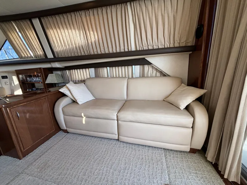 Slide: The Image of Luxurious interior of 2008 Carver 360 Sport Sedan with beige sofa and elegant decor. - 33