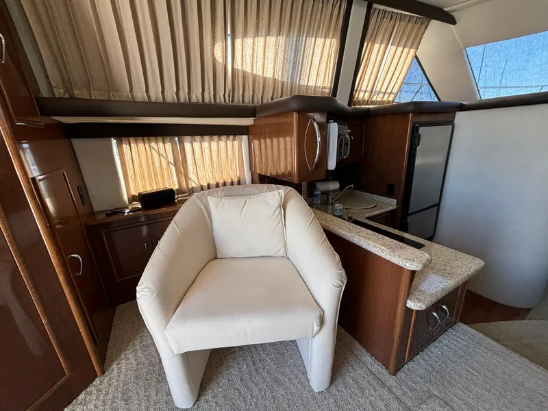 Slide: The Image of Interior of 2008 Carver 360 Sport Sedan with modern kitchen and plush seating. - 35