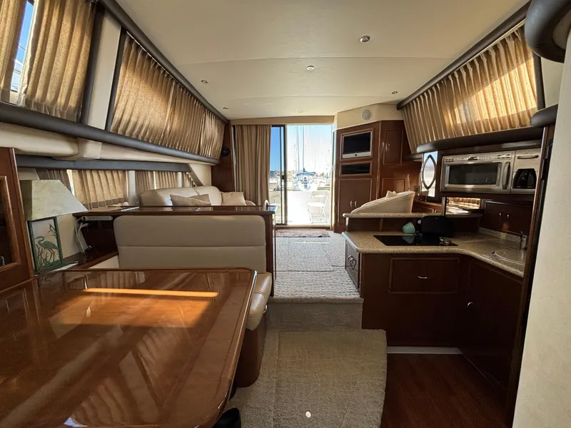 Slide: The Image of Interior of 2008 Carver 360 Sport Sedan with elegant wood finishes and modern amenities. - 43