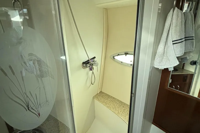 Slide: The Image of Shower area in 2008 Carver 360 Sport Sedan with porthole and elegant design. - 48