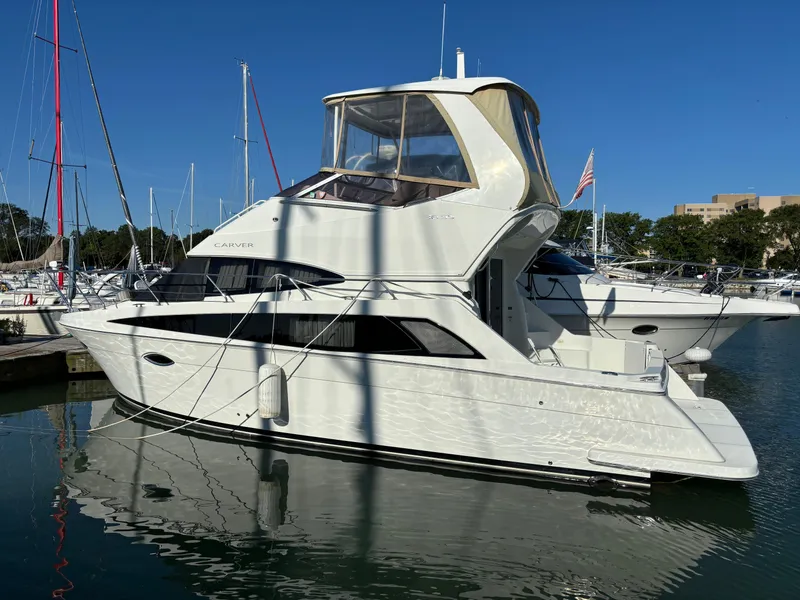Slide: The Image of 2008 Carver 360 Sport Sedan yacht docked in marina, clear blue sky. - 5