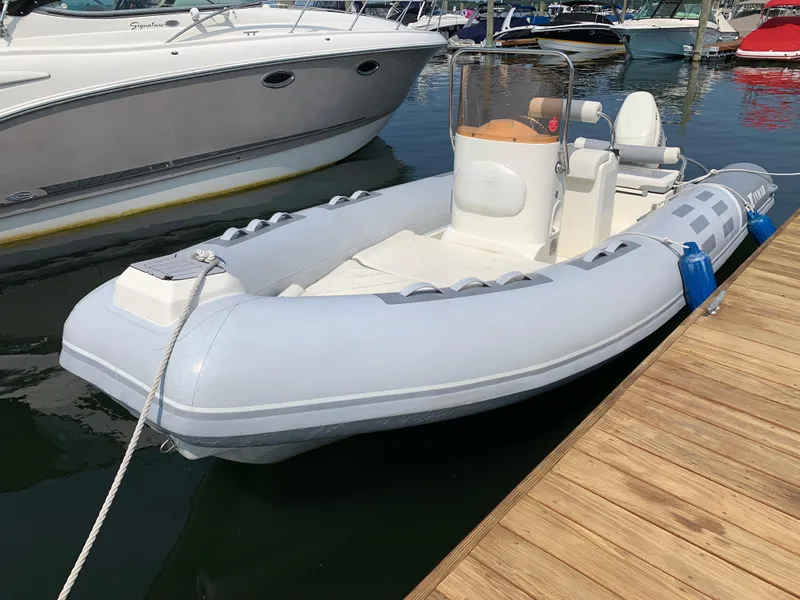 The Image of 2019 Inmar 635 inflatable boat docked at marina, side view. - 1