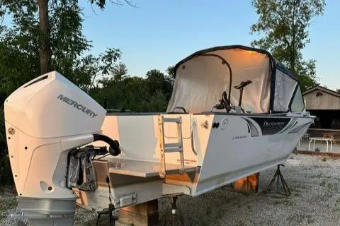 Slide: The Image of Stern View of the 2022 Duckworth 21' Discovery  - 3