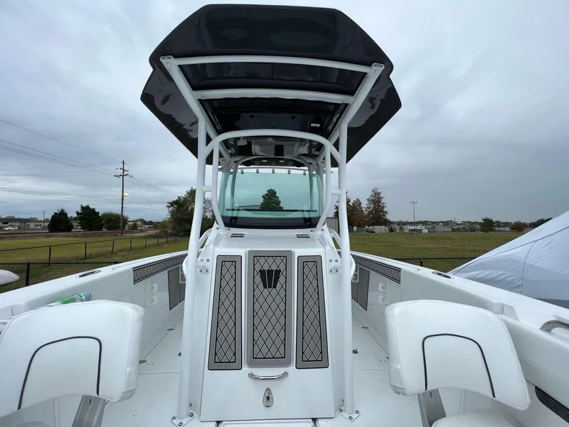 Slide: The Image of 2023 Wellcraft 262 Fisherman boat with sleek design and spacious deck. - 22