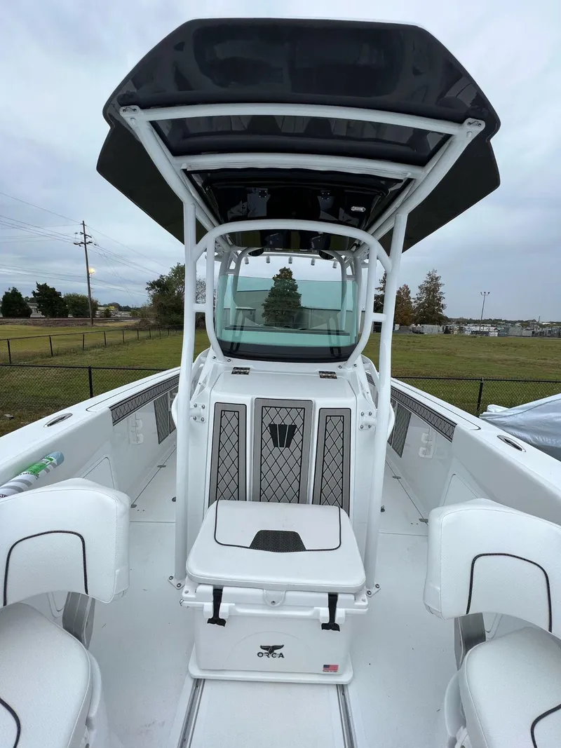 Slide: The Image of 2023 Wellcraft 262 Fisherman boat interior with seating and console. - 26