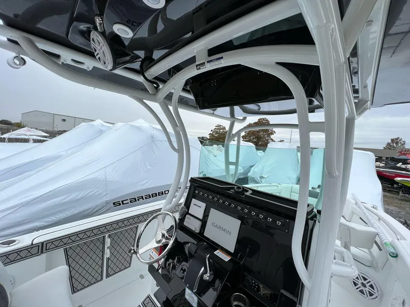 Slide: The Image of 2023 Wellcraft 262 Fisherman boat interior with Garmin navigation system. - 35