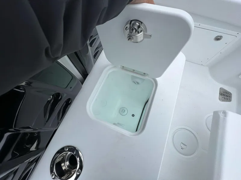 Slide: The Image of 2023 Wellcraft 262 Fisherman boat storage compartment with open hatch. - 41